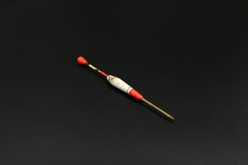 fishing float on black background