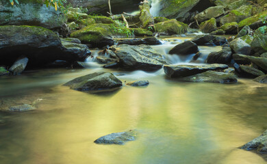 Naklejka na ściany i meble Stream near Boone North Carolina with a small waterfall behind