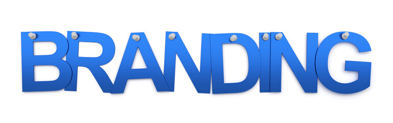 Word branding written with blue letters pinned on white wall.