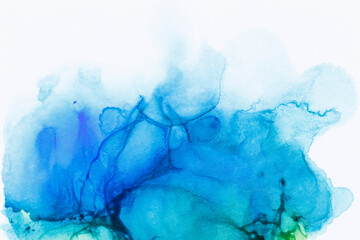Macro close-up of abstract blue alcohol ink texture on white. Fluid ink, colorful textured...