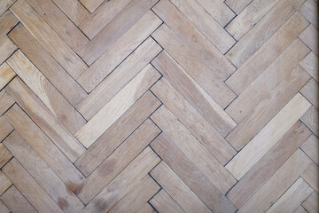 Old oak parquet floor background with scratches and stains needed to be renew of replaced