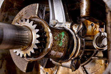 Crankshaft mounted in a small internal combustion engine. The interior of the gasoline engine...