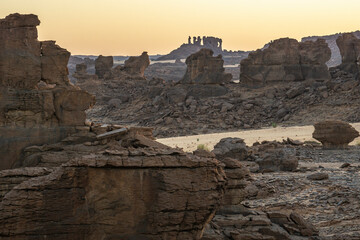 Sandstone pinnacles in the Sahara desert at sunset, Chad, Africa