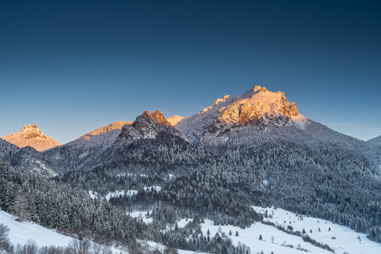 Velky Rozsuteck peak located in Mala Fatra National Park. I captured this picture during sunset in a place Stefanova village. It was freezing day without clouds and with great sun.