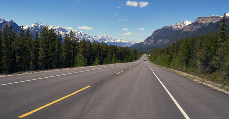 empty road rocky mountains