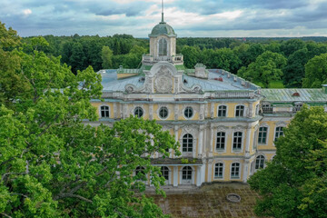Fototapeta na wymiar Aerial view of the facade of the Znamenka estate palace on a sunny summer day. Znamensky palace in Peterhof. Russia, Peterhof, 07.20.2020