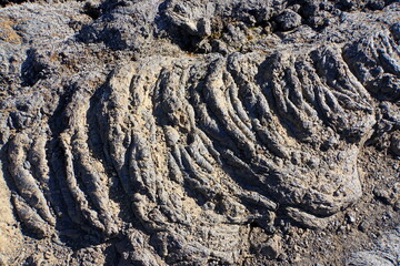 The frozen lava patterns and the remnants of the volcanic eruptions near Krafla Lava Field, Myvatn,...
