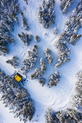 Aerial drone photo of a group of skiers and snowboarders in a snow cat in the Chic Choc Mountains...