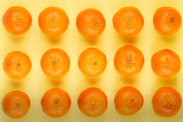 Tangerine pattern on yellow background.
