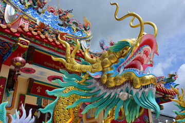 Chinese art shrine in Thailand. It is the worship of people in Chonburi, Thailand. Chinese sculpture Made of stone decorated inside the shrine area. Chinese dragon statue Chinese decoration According