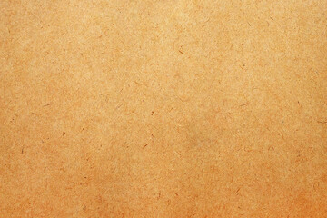 Brown paper or cardboard texture for background.