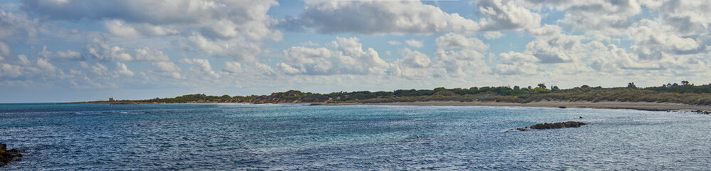 Panoramic View Of Torre Guaceto Beach Inside Torre Guaceto Marine Protected Area And Nature Reserve In Serranova Puglia Apulia Italy During a Bright Sunny day