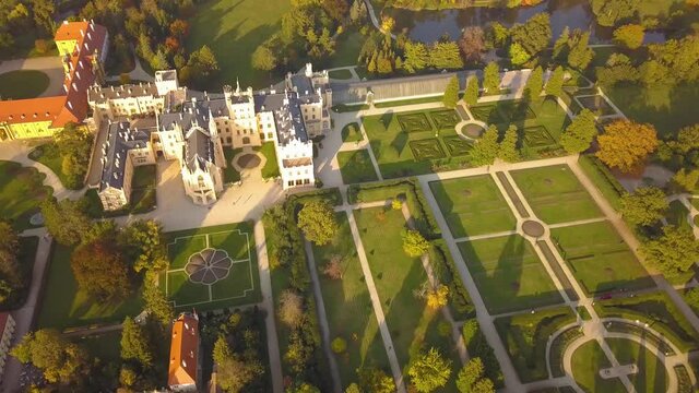 Aerial view of town Lednice and castle yard with green gardens in Moravia, Czech Republic. UNESCO World Heritage Site.