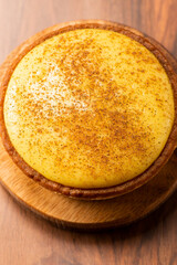 Delicious fresh baked custard tart sprinkled with ground nutmeg