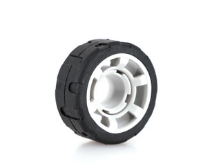 Toy tires on white background