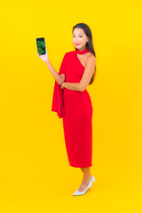 Portrait beautiful young asian woman with smart mobile phone with credit card