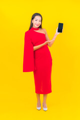 Portrait beautiful young asian woman with smart mobile phone with credit card