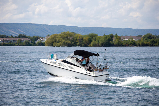 A small fishing boat returns to the Collingwood Harbor after a day of down rigging for salmon and rainbow trout in Georgian Bay