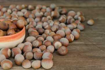 hazelnuts on rustic natural wood table