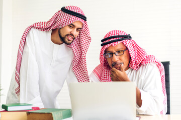 Successful of two arab  business people working with laptop computer.creative arabic people...