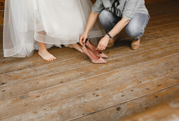 Bride's legs and dress.