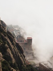 Panorama view of Santa Maria de Montserrat Abbey mountain monastery in Monistrol near Barcelona...