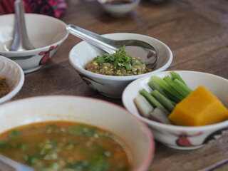 Nam Prik Num, Northern Thai Green Chilli Dip, food in white bowl eat with vegetable