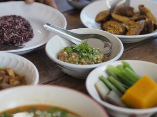 Nam Prik Num, Northern Thai Green Chilli Dip, food in white bowl eat with vegetable