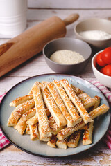 salty sesame bread sticks traditional homemade baked snacks on the table - close up healthy vegan or vegetarian food concept
