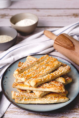 salty sesame bread sticks traditional homemade baked snacks on the table - close up healthy vegan or vegetarian food concept