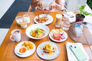 eating variety food for breakfast in morning