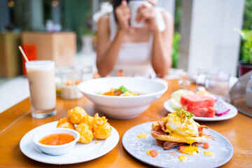 eating variety food for breakfast in morning