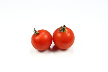 Pile of fresh and organic Japanese sweet tomato isolated on the white background. 