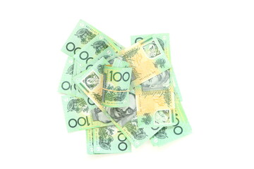 group of 100 dollar Australian notes expand and roll on white background