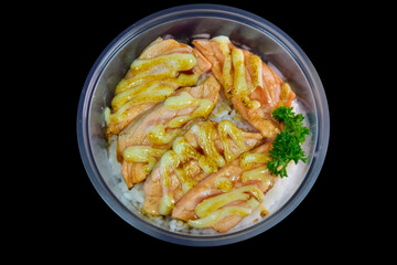 Grilled Salmon with Sauce in bowl plastic on background.