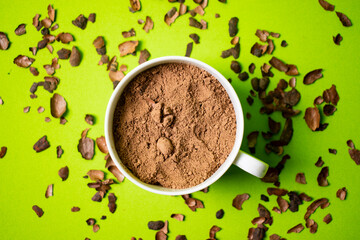cocoa inside a white cup with green background