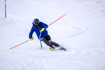 Fototapeta na wymiar People are having fun in downhill skiing and snowboarding 