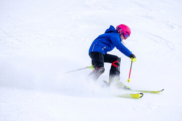 People are having fun in downhill skiing and snowboarding	