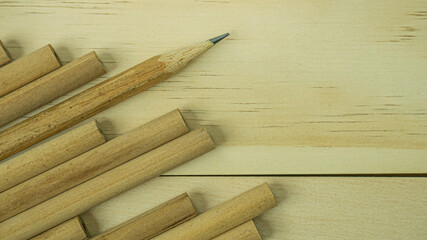 The wood pencils on wood table for background content..