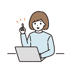 パソコンの前で指差しをする女性