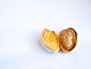 Almond nut in shell isolated on white background