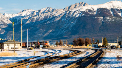 Winter view of a train and railway tracks in Jasper, Canada