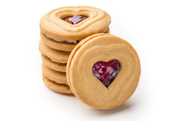Cookies. Cookie Hearts shape Red jam or strawberry jelly inside biscuit cookie. Homemade baking. Sweet bakery. Top view on white background.