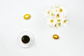 Happy Easter background with vibrant colored Easter eggs on white background. Top view