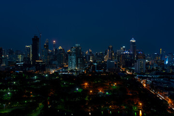 Fototapeta na wymiar city skyline at night downtown bangkok from above