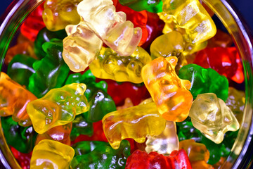 A jar full of colorful jelly candies