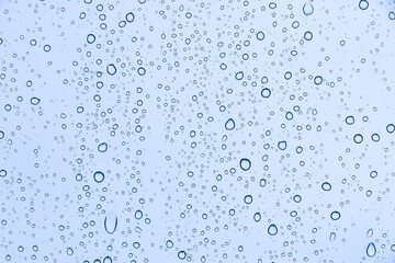 Rain drops on window glasses texture background