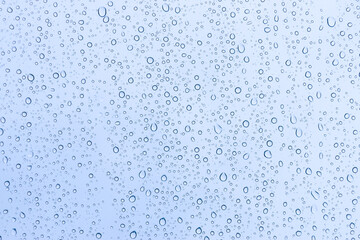 Rain drops on window glasses texture background