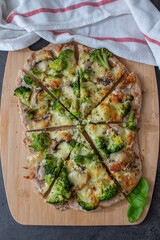 healthy green whole grain pizza with vegetables