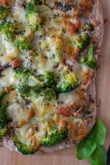 healthy green whole grain pizza with vegetables